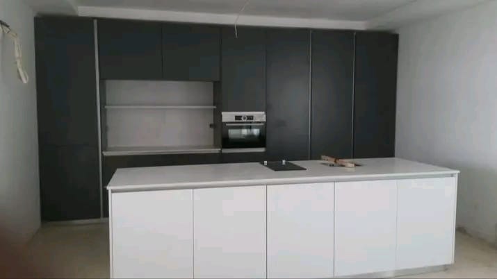 Matte charcoal kitchen with gloss white island