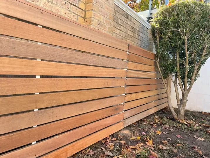 Hardwood slatted boundary screen