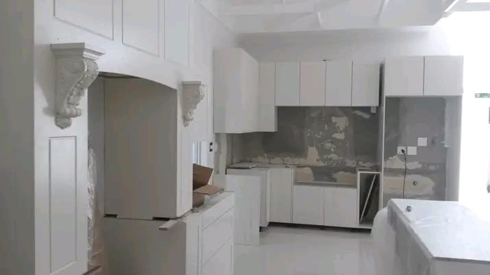 Classic white kitchen with carved corbel detailing