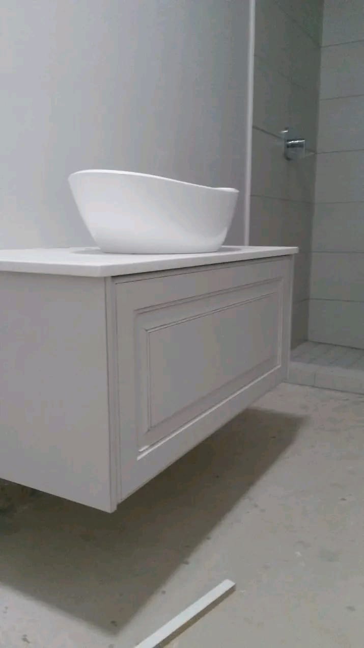 Floating bathroom vanity with vessel basin